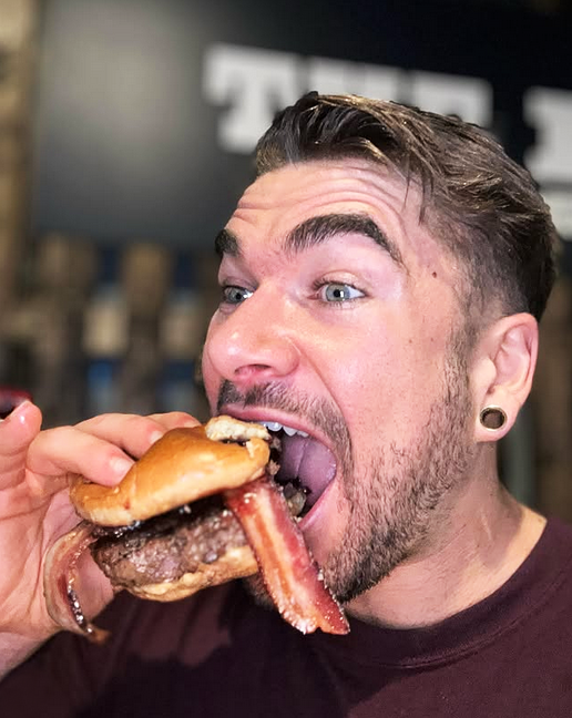 Man Eating Bacon Burger